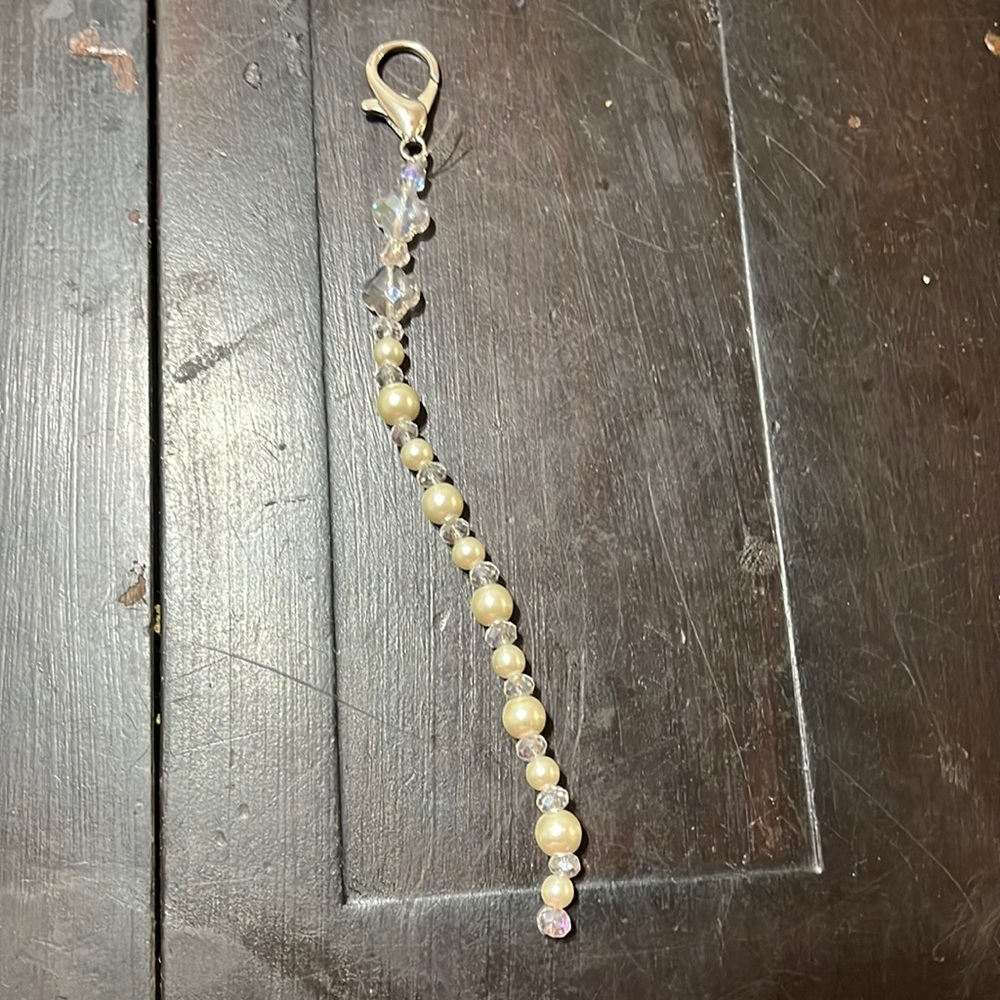 Purse charm or key charm.